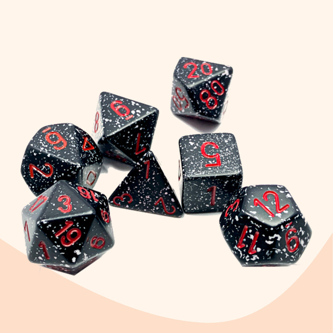 Chessex opaque set 7 polyhedral dobbelstenen Gestippeld ruimte zwart rood
